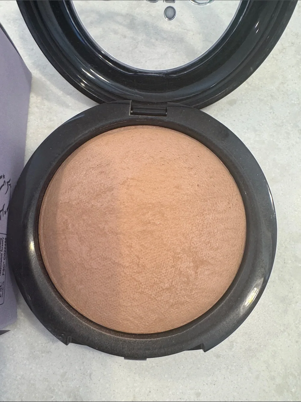 Saie Supersuede Radiant Baked Bronzer - color is Palermo